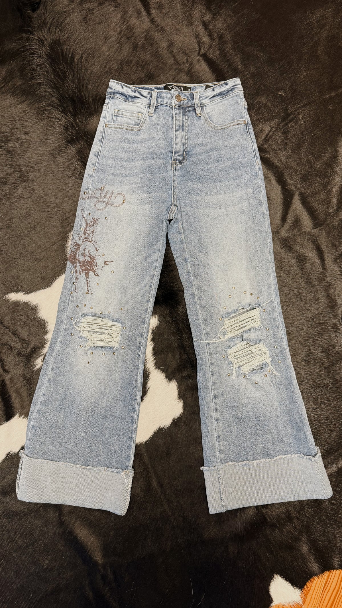 The Buckin Howdy Golden Jeans